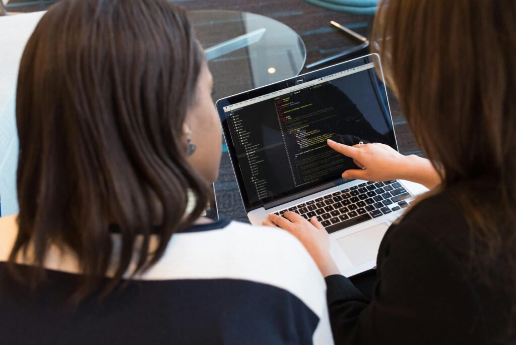 Programmer Working on Laptop